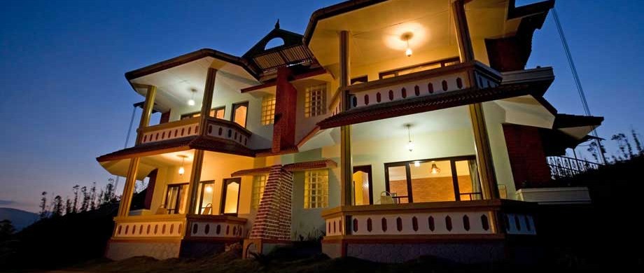 Munnar Camlot Resort cottage at night